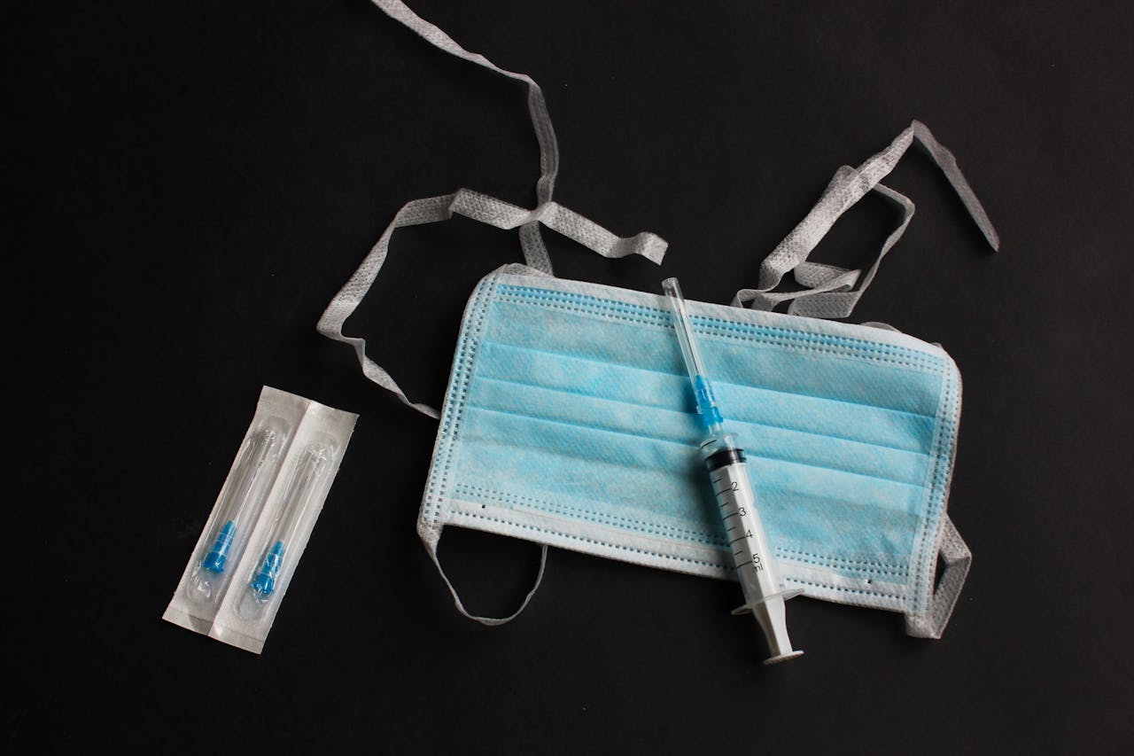 Syringe on a Surgical Mask